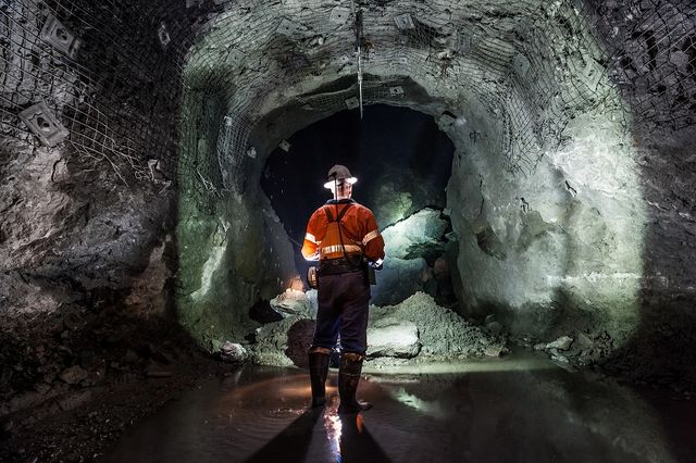 man using new technology in underground mine