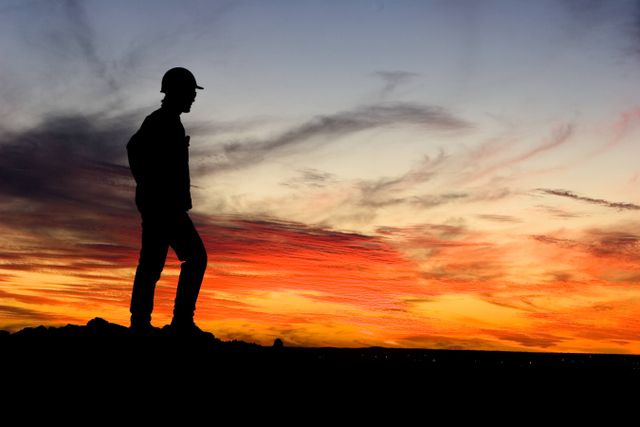 Person in front of sunset