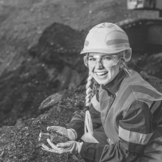 Female miner wearing PPE