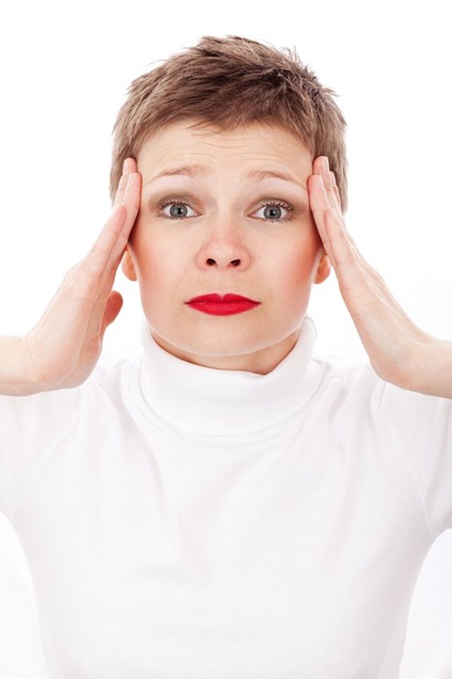 A woman looking stressed