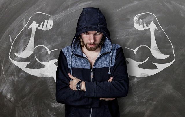 Man in front of a chalkboard