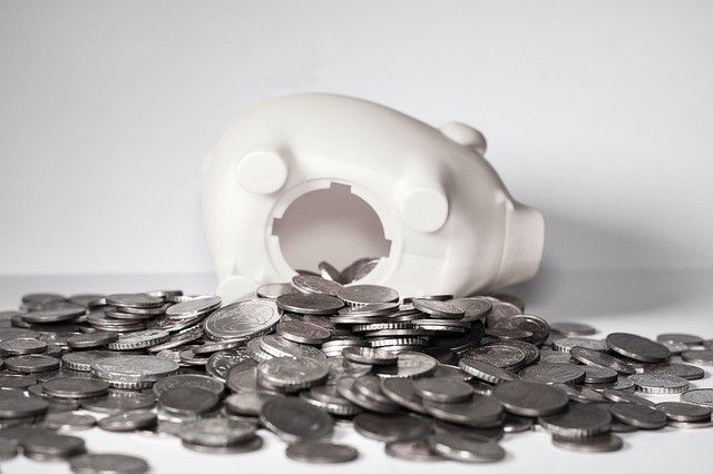 Broken open piggy bank