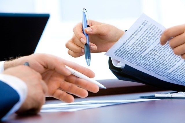 Picture of a table with paperwork