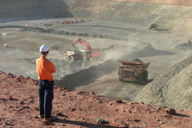 Miner overlooking the open pit