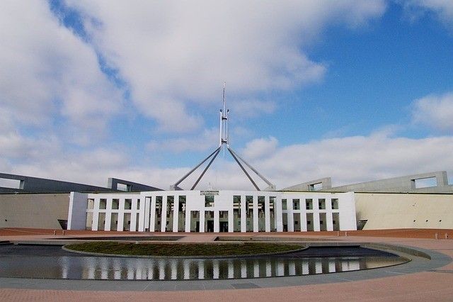 Parliament House in Canberra, where politicians are divided on the Adani coalmine.