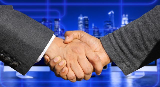 Business men shaking hands