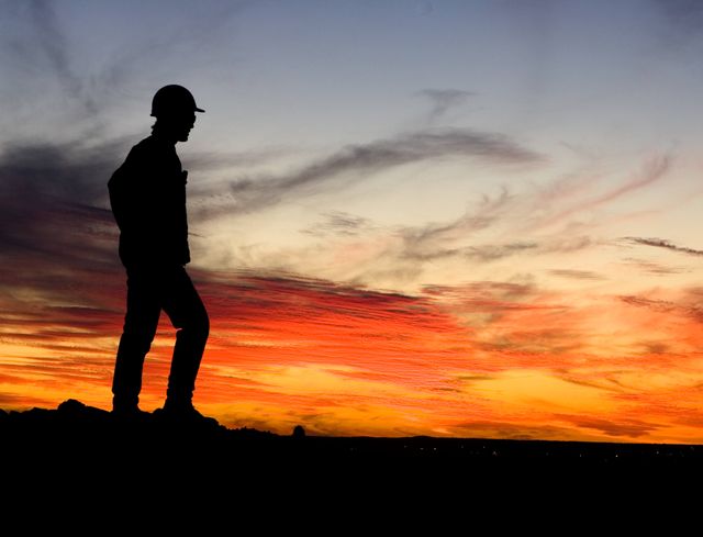 Man standing as the sun sets