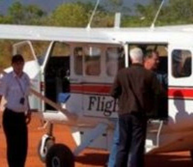 People boarding a plane