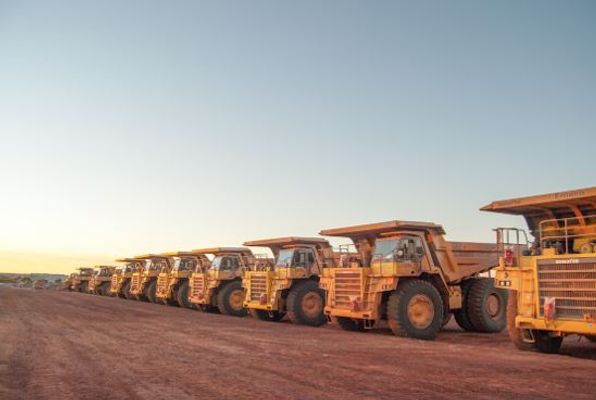 Dump trucks in a row