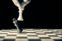 Chess pieces symbolising succession planning in mining executive appointments.