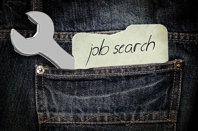 Wrench and 'Job Search' note in back pocket